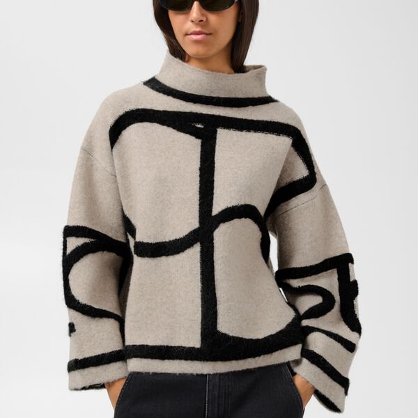 SLSorea Mono Pullover | Beige w Black monogram | Tr&ouml;ja, Soaked in Luxury